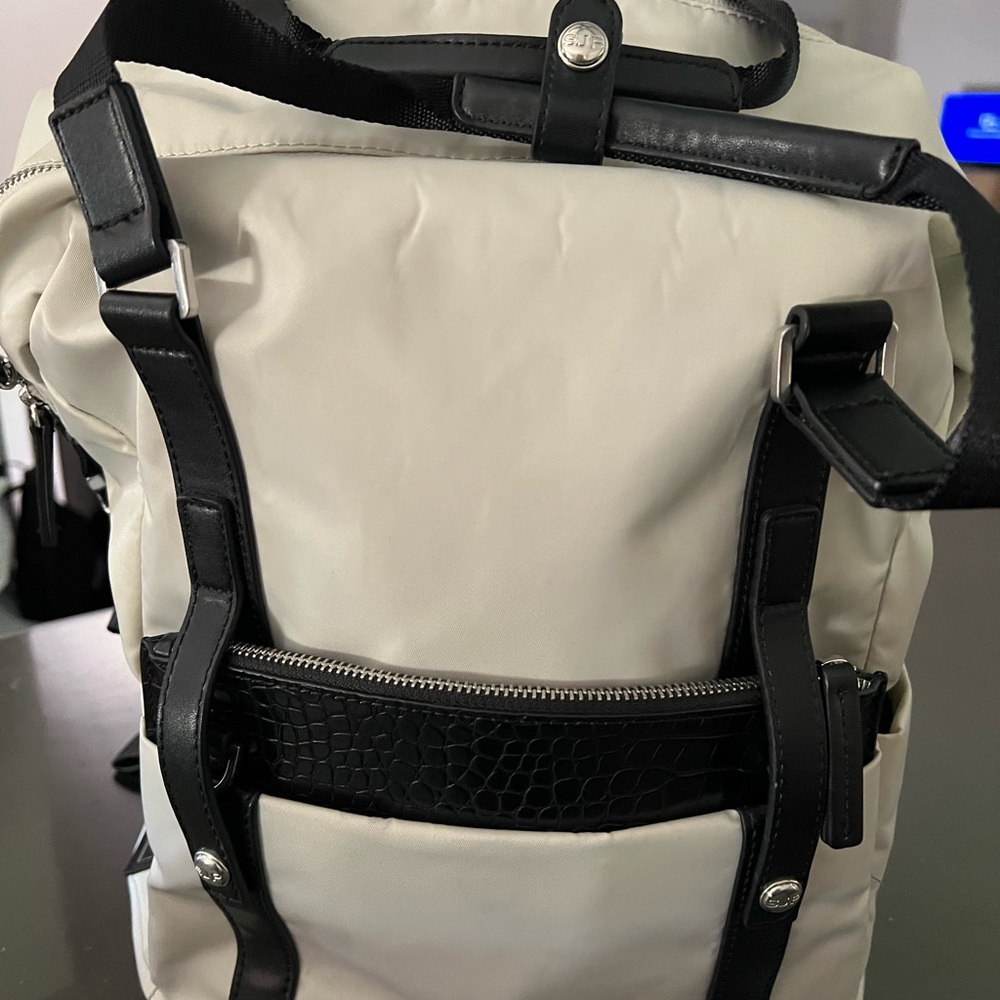 SJP by Sarah Jessica Parker Cream and Black Backpack with Modern Design